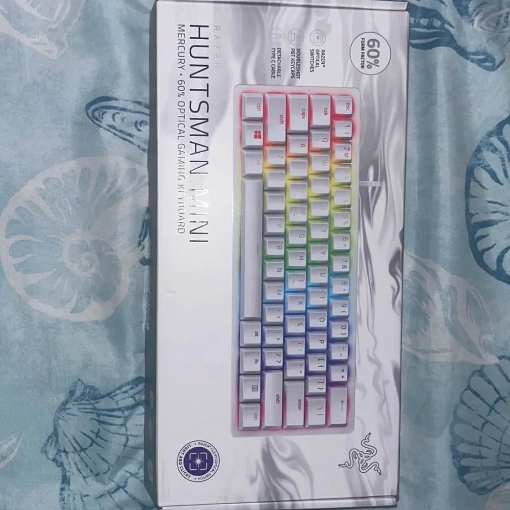 Brand new huntsman mini gaming keyboard never used.